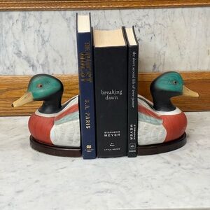 pair of vintage ceramic hand-painted mallard duck bookends with a wooden base
